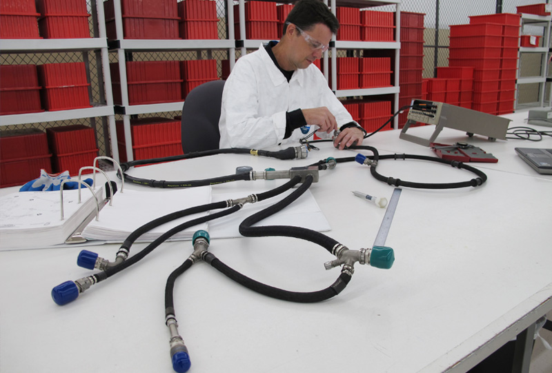 Employee repairing connector